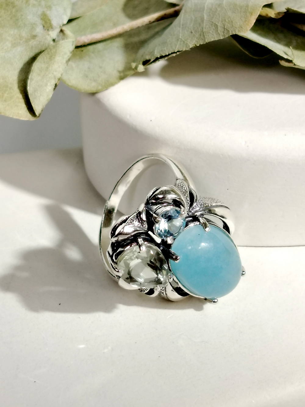 Серебряное кольцо с аквамарином, празиолитом и топазом